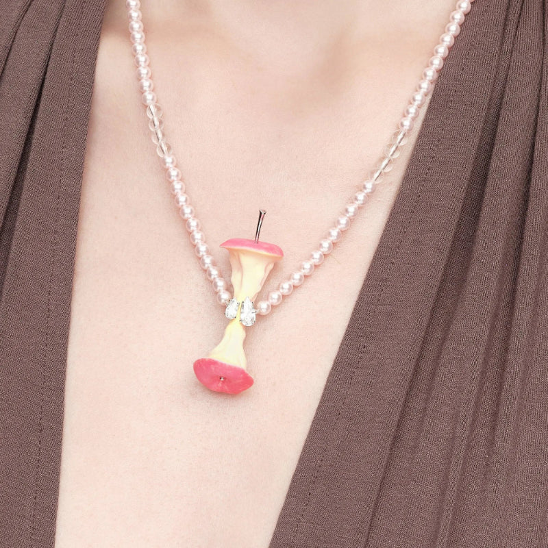 Apple core pendant detail on YVMIN Paradise Pearl Necklace Red