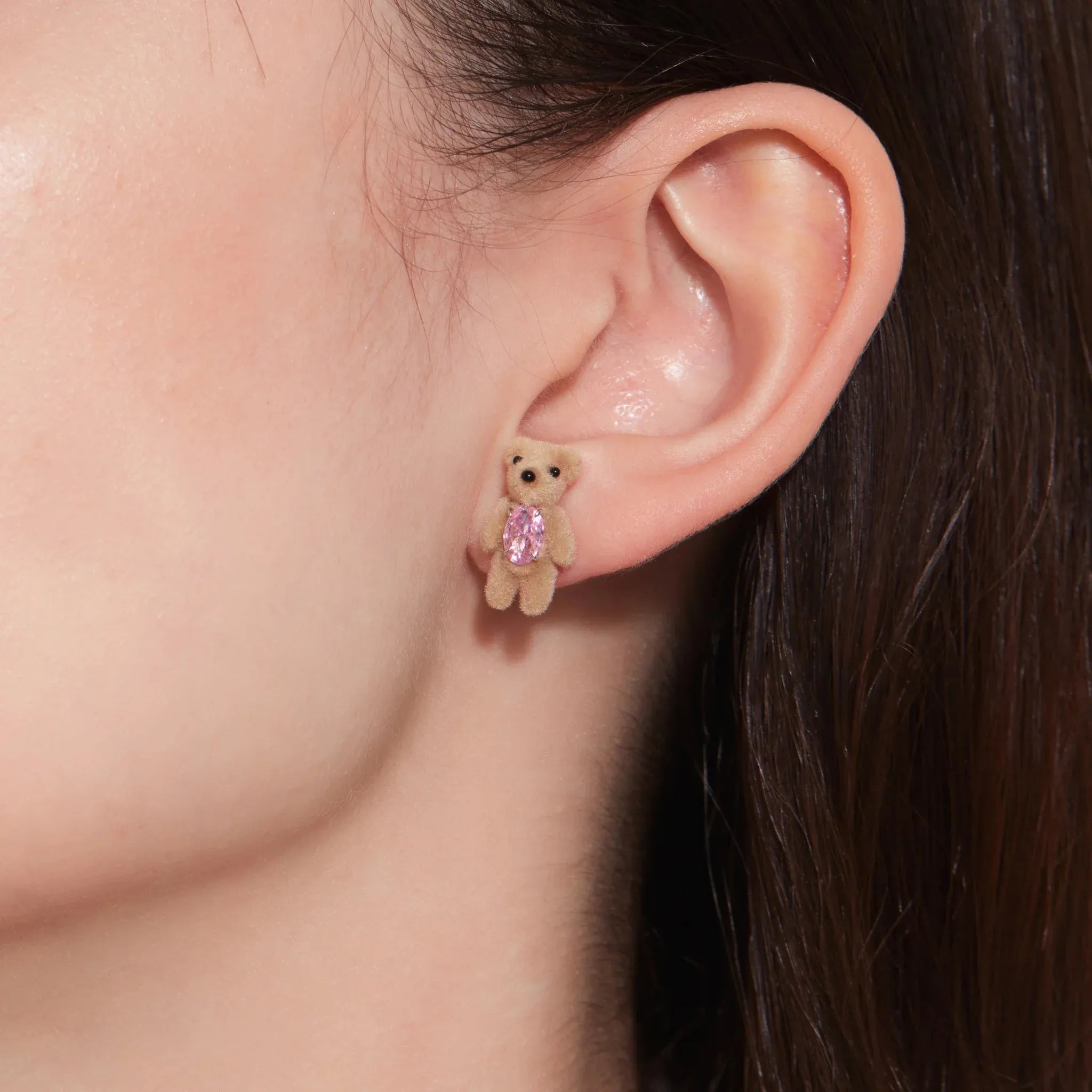 Close-up of YVMIN Paradise Flocked Mini Bear Earring Pink