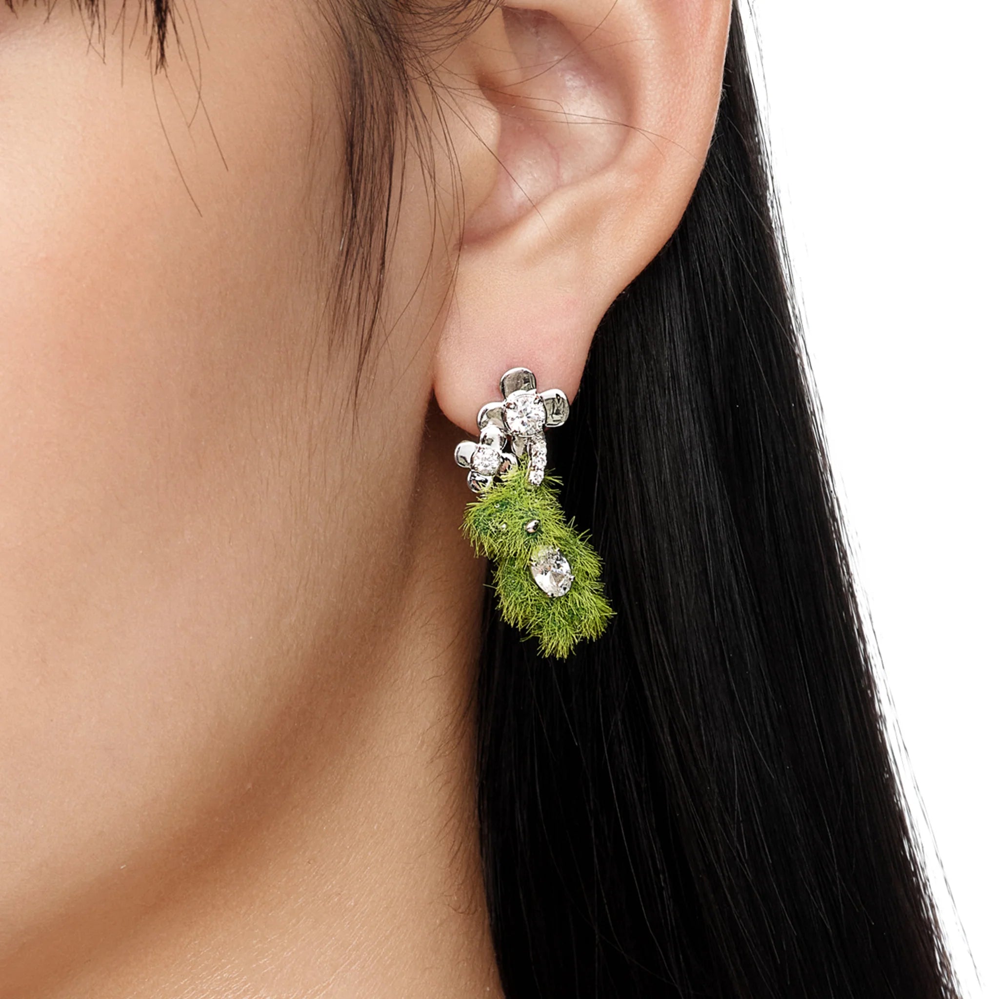 YVMIN Paradise Grass Flower Bear Earring in Green worn on ear