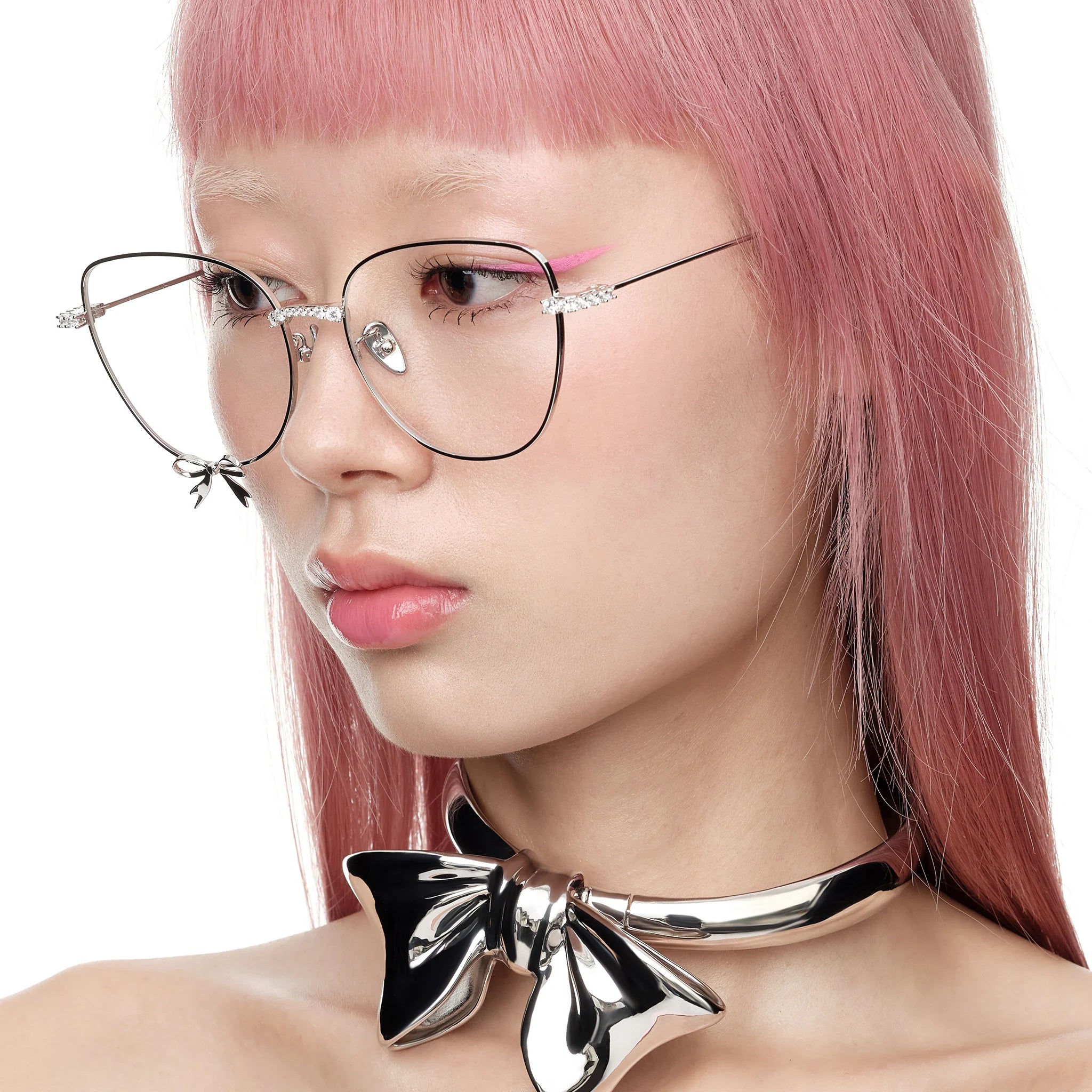Side view of model wearing YVMIN Paradise Metal Bow Glasses in Silver