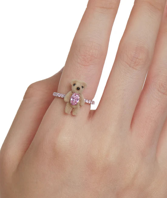 Close-up of YVMIN Paradise Mini Flocked Bear Gemstone Ring Pink on hand