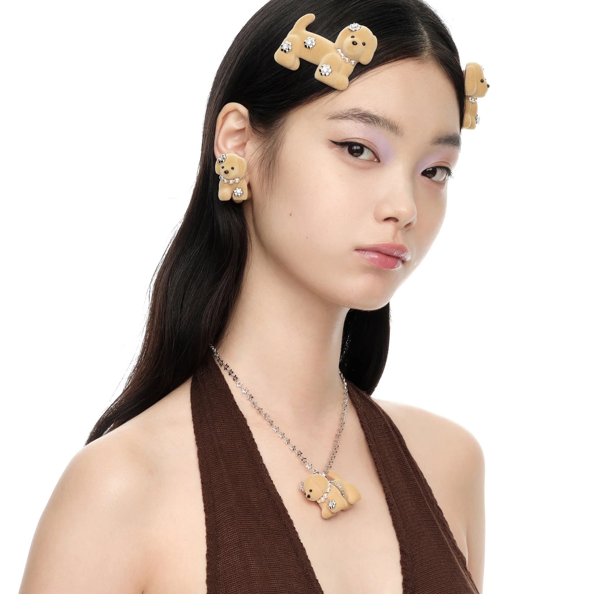 Model wearing YVMIN Paradise Puppy Necklace in Brown